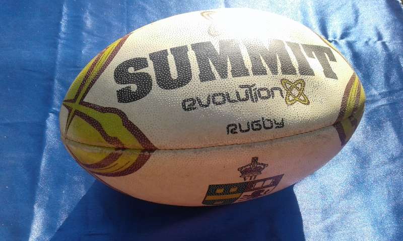 Rugby ball.  Summit Evolution. 320mm long.  Needs to be pumped.