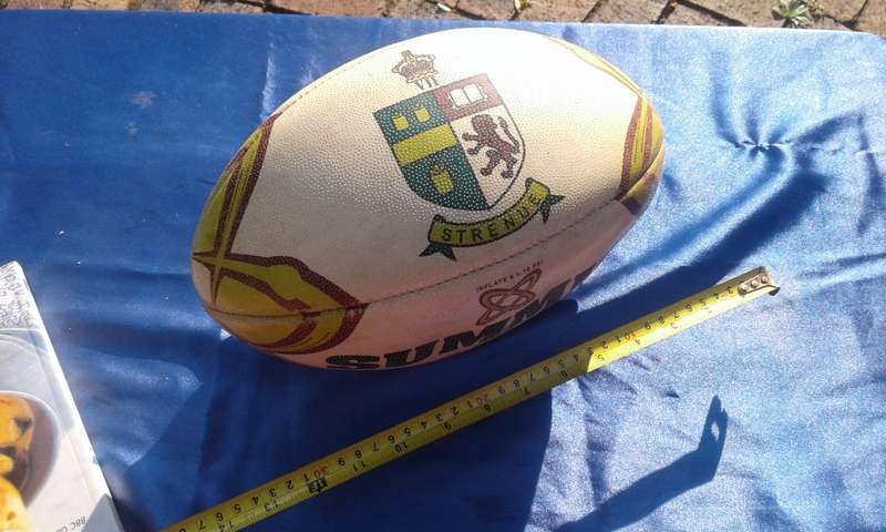Rugby ball.  Summit Evolution. 320mm long.  Needs to be pumped.