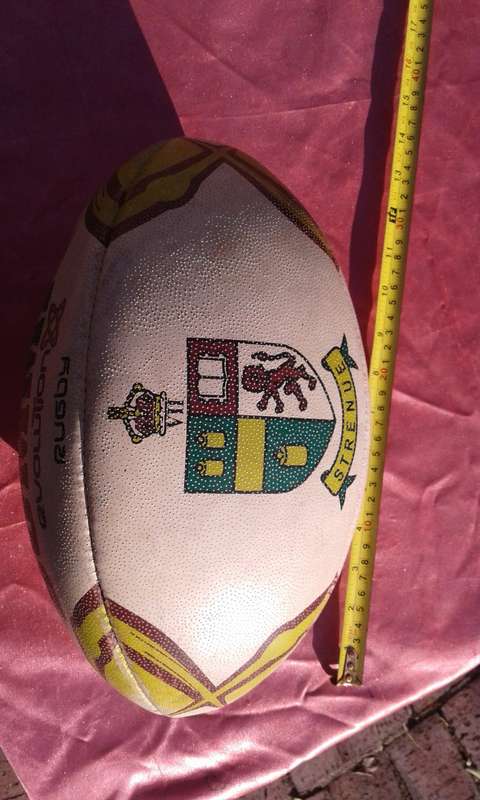Rugby ball.  Summit Evolution. 320mm long.  Needs to be pumped.