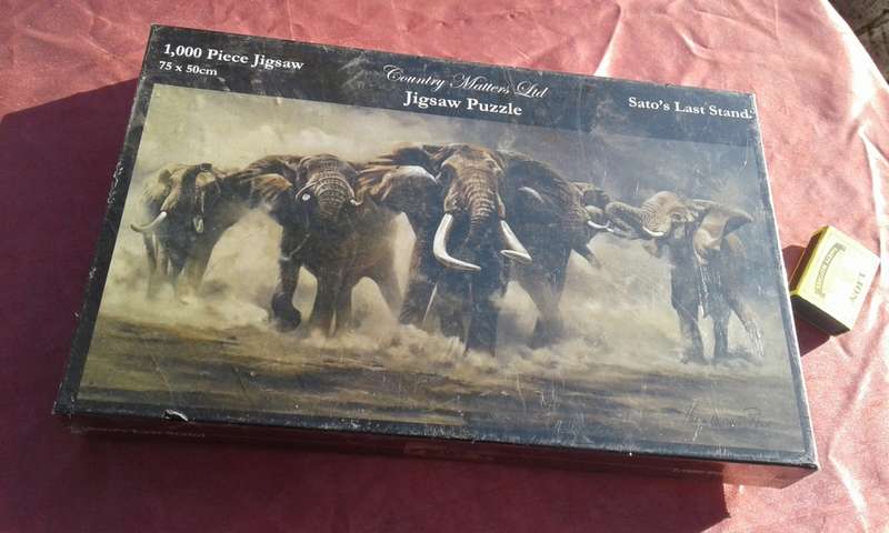 1000 piece jigsaw puzzle  Condition: Still sealed.