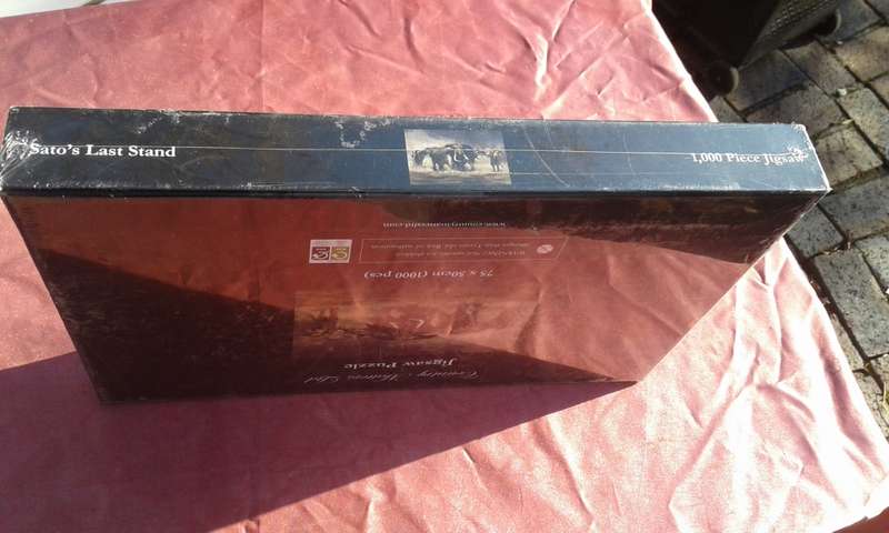 1000 piece jigsaw puzzle  Condition: Still sealed.