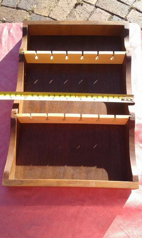 Spoon rack.  Pretty indigenous hard wood.