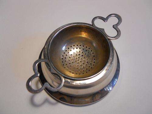 Hallmarked Silver Tea Strainer and Stand