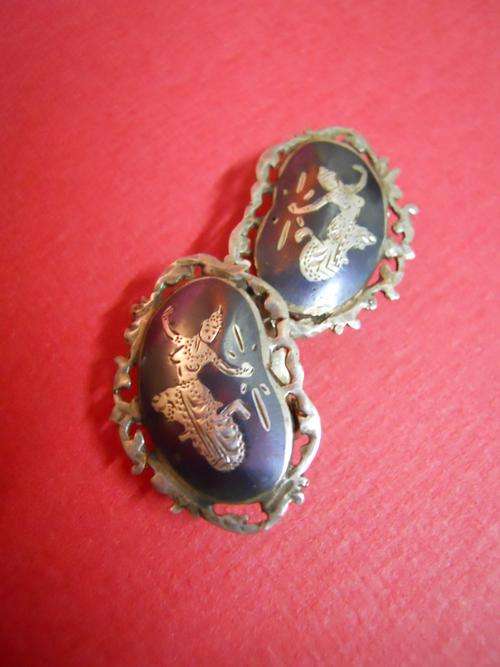 Siamese marked silver clip on earrings