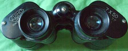  Information: 7x50 Magnification Field 7.1° Angle Coverage     Coated Lenses      Unit Code: No. 655914     Branded: Zuiho Tokyo     Rubberized Grip     Aluminium Housing     Front Lenses in Excellent Condition     Rear Lenses in Very Good Condition     Front Left Aluminium Rim Slightly Dented but Doesn't Affect Viewing     Removable and Adjustable Parts for Easy Access, Part Replacement, and Cleaning  7x50 Zuiho Tokyo Coated Lens Field 7.1° Binoculars far look spot spotting spotter bird watch watching spy secret agent detect detective police saps polisie rsa politze politie policing public scene scenery telescope star stars scope bargain great deal closing soon red hot wow amazing ocular sale bid auction nice great deal camping camp safari view viewing crazy wednesday snap friday wacky tuesday special weekend auction bid buy now