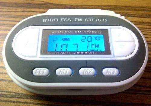 Wireless FM Transmitter with Integrated Car Charger / Power Mini-USB (ZLK018)   Information:      Almost Perfect Condition - Almost Never Used (One or two tiny light scratches)     Transmits FM Audio on 87.5Mhz to 108.0Mhz (Can Be Set with 0.1Mhz Difference)     205 Channels to Choose From     Connects to Any MP3 Player, Phone, Radio, or Audio Device from a Standard 3.5mm Audio Jack (The small standard type that PC headphones use)     Blue LCD Display with Back-Light, includes Frequency, Temperature, Real Time & Dynamic Transmit Icon and Has 3 Memory Keys     Size: Length 7.6cm, Width: 5cm, Height: 2.5cm     Frequency Response (Output): 20Hz ~ 20kHz     Working Current: 30mA     Uses 2x AAA 1.5V Batteries (Unless Powered Directly from Car Charger)     Ideal for Long-Distance Travel, Tidying Up Heaps of CD's, and Broadcasting Music to Multiple Cars Nearby (Group Meets, Parties, etc. for a Shared Sound System Experience) bargain mp3 music player wow usb pc portable walkman stereo noise sound epic brilliant party crazy bargain clearance sale wholesale lot item last one bid or buy special sale discount super cheap top quality nice red hot sale tune tuner ipod iphone ipad blackberry samsung