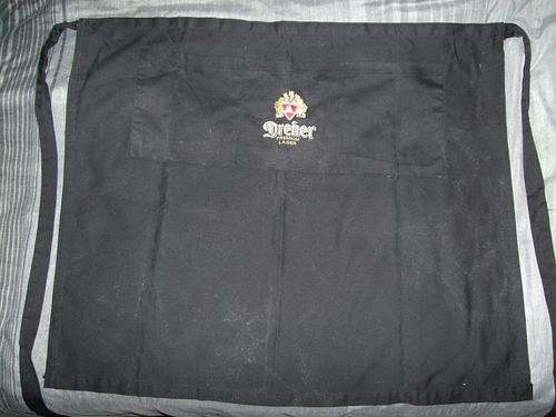 Genuine Unisex Bailey's Single Front Pocket Bar Apron (One Size Fits All: L: 98cm x H: 66cm)   Information:      Genuine Bailey's Original Irish Cream Unisex Bar Apron     Single Front Pocket     One Size Fits All (Length: 98cm x Height: 66cm)     Excellent Overall Condition (Left Strap Slightly Burnt by Ironing, Can Be Cut Out and Replaced / Repaired with Sewing / Stitching)     A Wonderful and Unique Addition to your Bar!     Please See Photos for Close-Up Details and Ask if you Have Any Questions low loest price lowest cost top quality genuine authentic bargain wow amazing odd unusual wow what a steal marvelous stunning waitor waitress waiter bar barman barmaid lady serve serving tray glass beer amstel tot shot whisky whiskey delicious amarula design club home house personal private function dreher premium lager 115cm 115 65 75