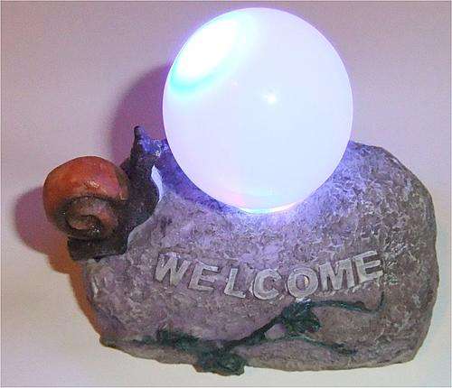 Adorable Hand-Painted 10.5cm Multi-Color LED Globe Orb Night Light Ornament with Red Snail  Information:      Multi-Color LED Globe Orb Ornament     Length: 10.5cm     Width: 7cm     Height: 9.5cm     Composition: Textured Plastic Hand-Painted Molded Shell     LED Color Change Mode can be Changed by Switching Off and On Again     Very Good Physical Condition, Light Switch slightly Sensitive but Works Fine     Takes 3x AAA Batteries (Not Included)     Please See Photos for Further Details ceramic snail slug cute adorable nightlight child chidlren kid bedroom sleep nightmare peace peaceful glow glowing adjustable set smd led lcd bulb electric electronic portable kawaii moon sphere bedside bed side