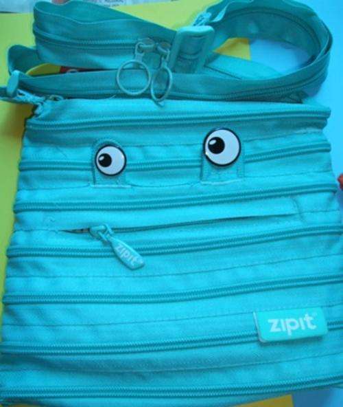 Zipit Monster Mini Shoulder Bag and Coin Purse set two match keys wallet phone other essentials inside   compartment one long zipper zippers Lightweight & portable external pocket Features monster eyes & teeth   adjustable zipper strap medium-sized items Material Polyester Pouches lunch money house keys safe holder clasp   fits easily on backpack or inside of a purse silver Circular easy zipping orange light blue green funky fun   kids children students bags accessories weird wacky smiling smile wide stationary school supplies pencil pen   case eyes and teeth friendly personality present gift birthday christmas valentinesday mothersday holidays new   years closing soon must have bid buy now collect collection collectable item sale bargain low price cheap   crazy tuesday wacky wednesday snap friday special weekend auction