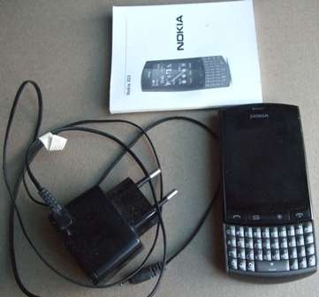 Nokia Asha 303 Cellphone original box charger manual electronics gadgets adpter phone telephone dial contacts phonebook whatsup whatssup apps angry birds touchscreen display resolution of 240 pixels by 320 pixels camera slim Wi-Fi Bluetooth FM radio screen user customizable facebook twitter calendar alert alarm clock feautures keyboard Qwerty 3G series compact gift present birthday valentinesday christmas new year holiday mothersday fathersday closing soon must have bid buy now crazy tuesday wacky wednesday snap friday weekend special auction cheap low price bargain sale save second hand secondhand used