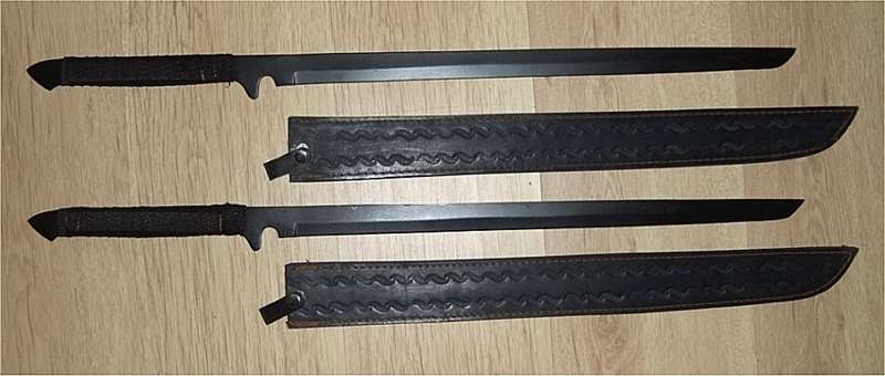 Set of 74cm Hand-Crafted Twin Black Blades - 3/4 Tang, Half-Sharpened, Leather Sheaths, Nylon Wraps   Information:      Set of 2x Twin Black Swords including Full Leather Sheaths     Sharpness: Half-Sharpened     Tang: 3/4 Tang     Sword Length: 74cm     HandleLength: 24cm     Blade Length: 50cm     Sheath Length: 53.5cm     Sword Color: Black     Sword Composition: Mild Steel     Wrap Composition: Nylon Wrap (Slightly Loose as per Photos)     Sheath Composition: Full Leather (Thick Sturdy Leather) with Sword-Clips and Belt Loops     Hand-Crafted Set - Country of Origin Unknown     Not Suitable for Children, Not a Toy     Ideal for Collectors, Decoration, Cosplay, Themed Party, Theater, etc.     See Photos for Details (Please ask if you have any questions) dagger wakizashi ninja samurai sword japan swaard swordsmanship kendo ken tanto blade edge dagger knife wow stunning collector collectible unique rare scarce one of a kind unbelievable weapon budo spirit strong sharp edge