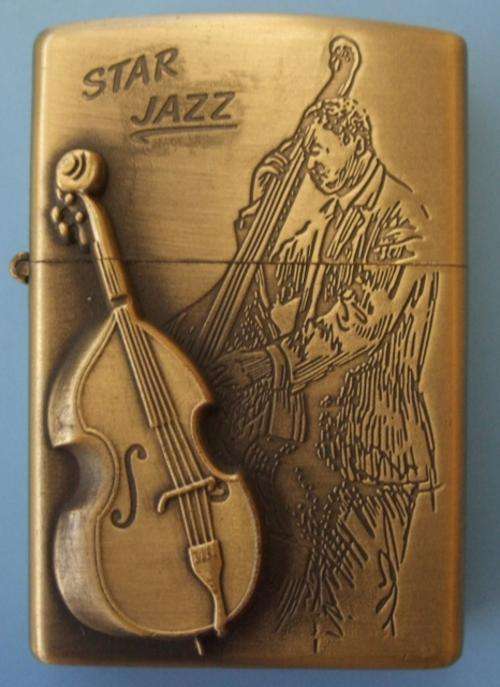 Star Jazz golden bronz brons design guitar player music lighter flame fire firestarter elegant beautiful stunning amazing musician bar lounge bussiness conferances party parties gatherings travel show trophy zippo torch square collection collectable antique german must have amazing collect bargain low price cheap crazy wednesday wacky friday weekend auction closing soon get now old 