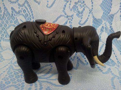 Battery Operated, Walking, Water spraying, Trumpeting Elephant Toy