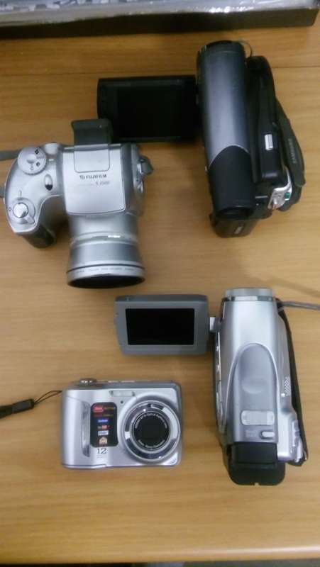 **MASSIVE DEAL** 2 Video Cameras and 2 Cameras for Sale!