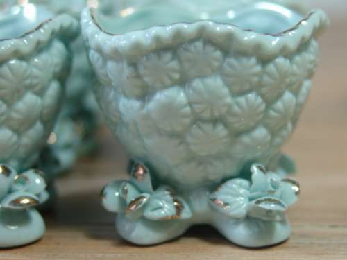 A set of 9 Vintage porcelain Egg Cups, blue with gold trim, excellent condition