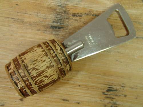 Bottle opener with barrel shaped handle