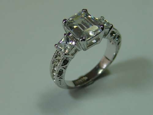 White Sapphires Ring set in 18ct white filled Gold