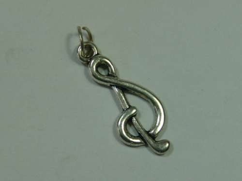 Silver tone Pendant, shaped like a music note.