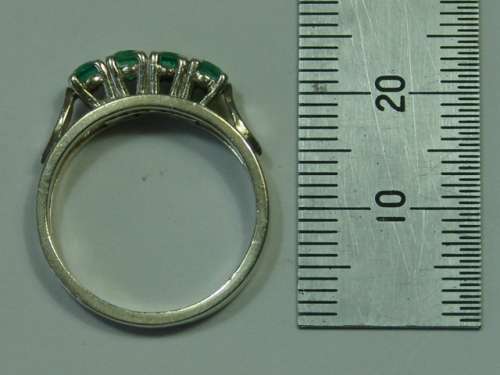 Half  eternity Sterling Silver and Emerald Ring. Total weight 3,5 grams