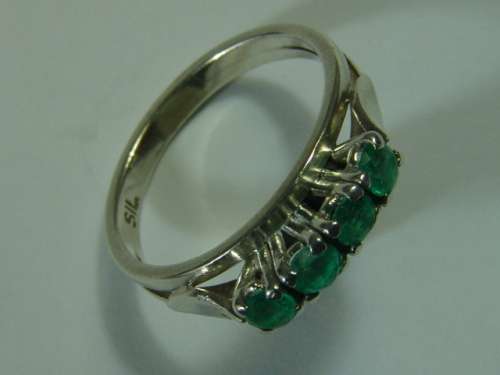 Half  eternity Sterling Silver and Emerald Ring. Total weight 3,5 grams