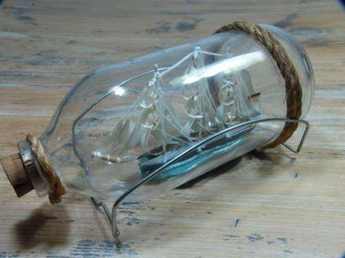 Sail Boat in a Bottle with metal wire stand, 18cm long, vintage 1960's