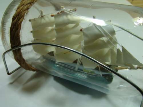 Sail Boat in a Bottle with metal wire stand, 18cm long, vintage 1960's