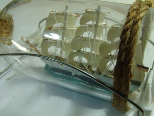 Sail Boat in a Bottle with metal wire stand, 18cm long, vintage 1960's