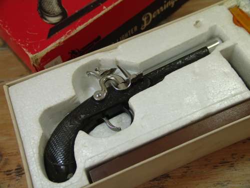 Very rare Derringer Table gas Lighter, metal Gun with wooden stand, early 1950's. Original