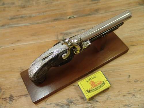 Very rare Derringer Table gas Lighter, metal Gun with wooden stand, early 1950's. Original