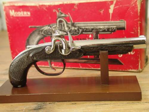 Very rare Derringer Table gas Lighter, metal Gun with wooden stand, early 1950's. Original