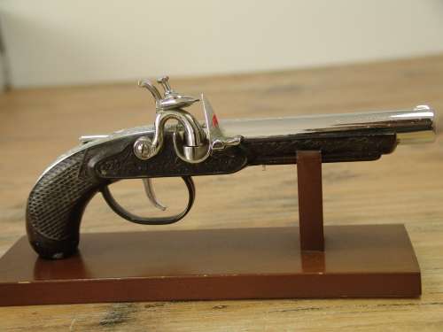 Very rare Derringer Table gas Lighter, metal Gun with wooden stand, early 1950's. Original