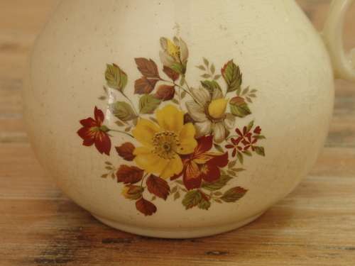 Small vintage porcelain Jug with flower detail - 12cm deep