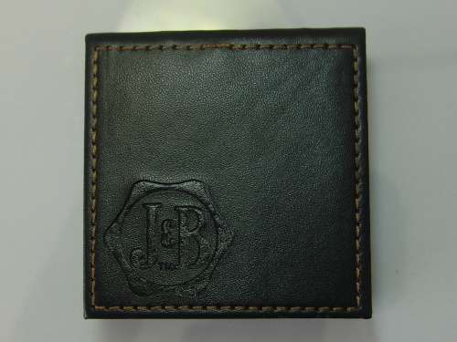 Set of 4 J&B Jet leather coasters in original box, 6,5cm x 6,5cm, Mint