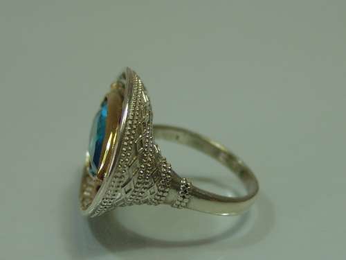 Chunky and heavy silver and Gilded Ring set with blue stone, 10.1grams