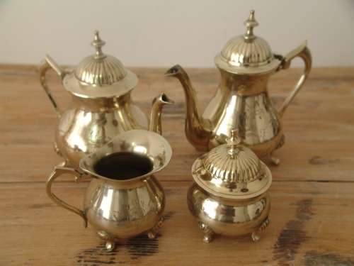 Rare solid brass complete Coffee / Tea service set with silver inside. 4 items. Excellent condition