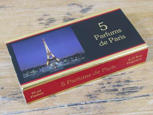 Boxed set of 5 vinatage mini Parfumes de Paris samples with content.