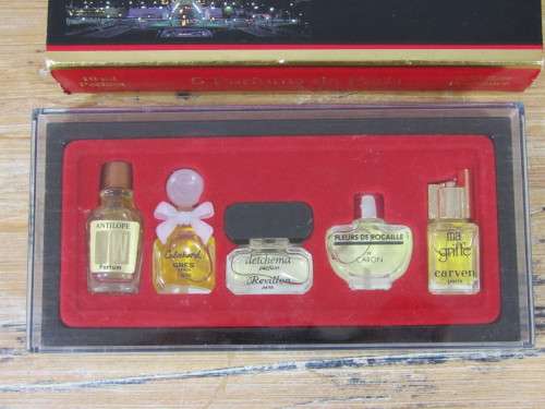 Boxed set of 5 vinatage mini Parfumes de Paris samples with content.