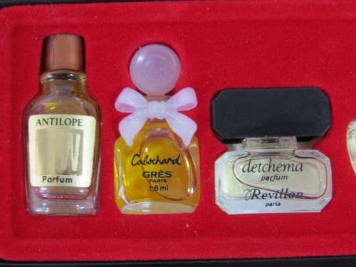 Boxed set of 5 vinatage mini Parfumes de Paris samples with content.