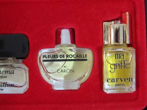 Boxed set of 5 vinatage mini Parfumes de Paris samples with content.