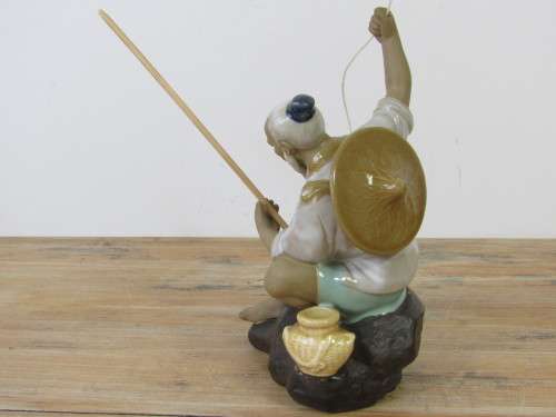Vintage Oriental glazed ceramic Figurine, Chinese man fishing, 20cm tall, excellent condition