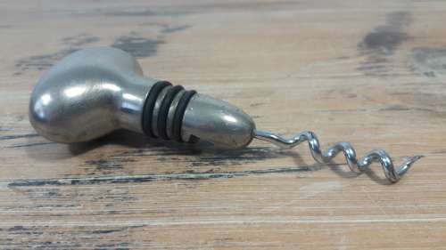 Vintage stainless steel bottle stopper and opener