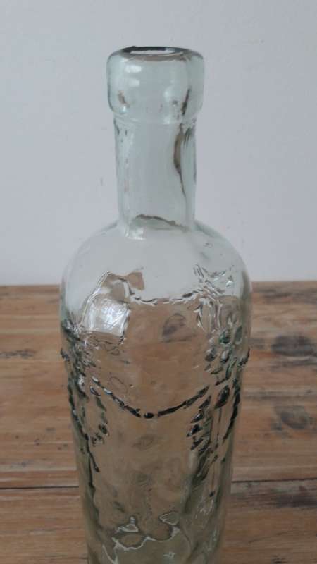 Vintage decorative glass bottle