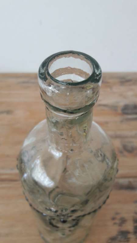 Vintage decorative glass bottle