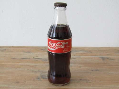 Vintage 250ml sealed Coca Cola Bottle, full