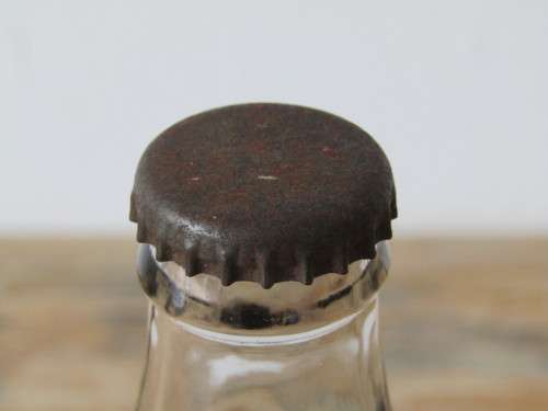 Vintage 250ml sealed Coca Cola Bottle, full