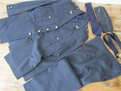 Old SAAF Lieutenant dress Uniform from the 1980's. Jacket with insignia, Pants, Belt, Cap and Tie