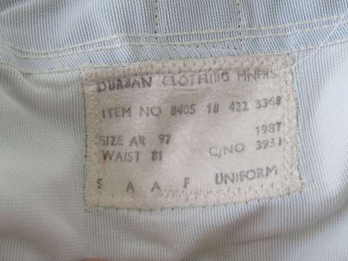 Old SAAF Lieutenant dress Uniform from the 1980's. Jacket with insignia, Pants, Belt, Cap and Tie