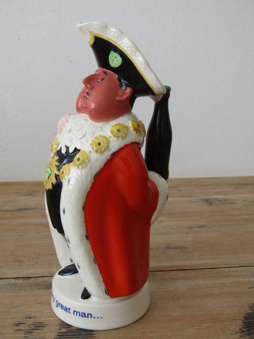 A humerous Beswick Character toby Jug "Behind every great Man", large 23cm