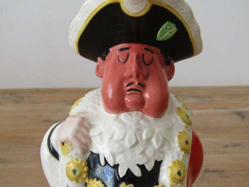 A humerous Beswick Character toby Jug "Behind every great Man", large 23cm