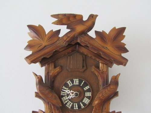 Vintage wall mounted wooden mechanical Cukoo Clock with Weights and Pendulum, made in Germany